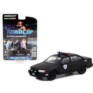 1986 Ford Taurus LX Matt Black "Detroit Police" "RoboCop" (1987) Movie "Hollywood Series" 1/64 Diecast Model Car by Greenlight - 1 of 3