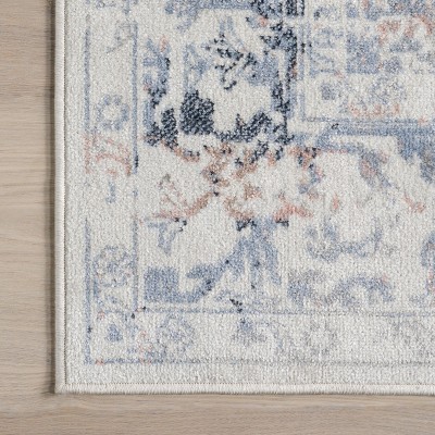Everlee Blue and Beige Washable Synthetic 9' x 12' Area Rug