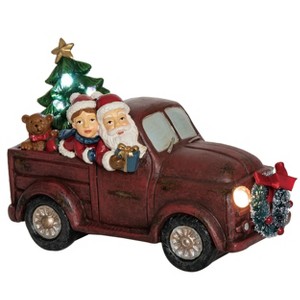 Transpac Resin 7.48 in. Red Christmas Light Up Musical Santa Wagon - 1 of 2