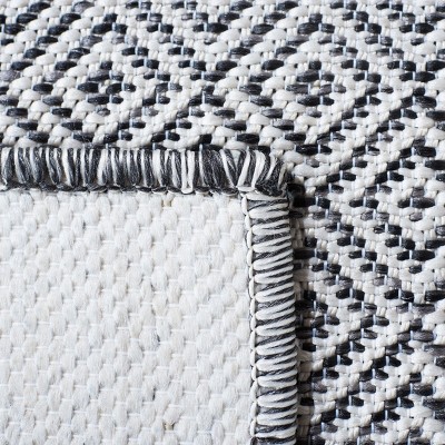 Ivory and Black Rectangular Geometric Indoor/Outdoor Rug