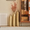Dolonm Distressed Gold Metal Vase Trio, 3D Triangle Pattern Cylinder Floor Vases, Industrial Glam Home Décor Set - 4 of 4