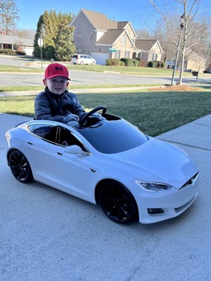 Tesla store toddler car