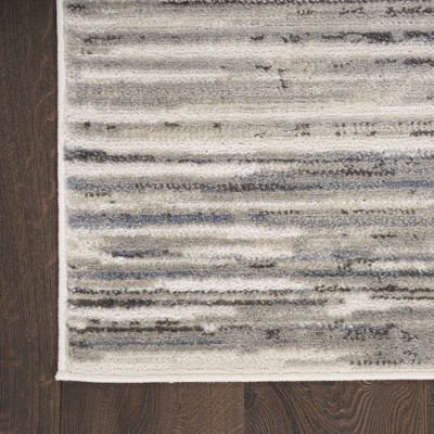 Ivory Grey Blue Abstract Synthetic 5' x 7' Area Rug