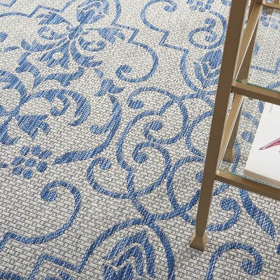 Ivory & Blue Classic Scroll 7' x 10' Synthetic Outdoor Rug