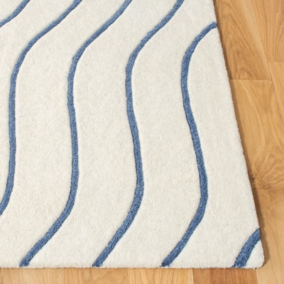 Ivory Elegance Round Tufted Wool-Silk Blend Area Rug, 59 in