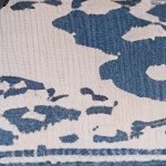 blue cushion/gray wicker