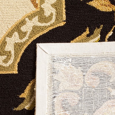 Handmade Easy-Care Classic Brown 47" Synthetic Area Rug