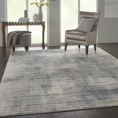 Modern Abstract Blue & Ivory Synthetic 9'3" x 12'9" Area Rug