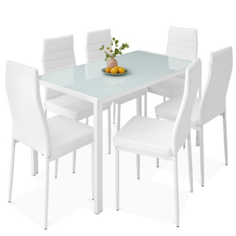 Glass table with 2024 white leather chairs