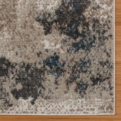 Blue and Beige Tufted Rectangular 5' x 7' Synthetic Area Rug