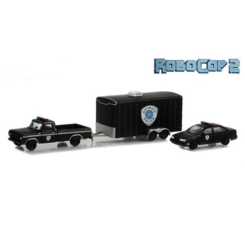 Greenlight Collectibles 1/64 1979 Ford F-150 Pickup Truck with 1986 Ford  Taurus with Enclosed Car Hauler Trailer Robocop 2 Hitch & Tow 11 31150-A