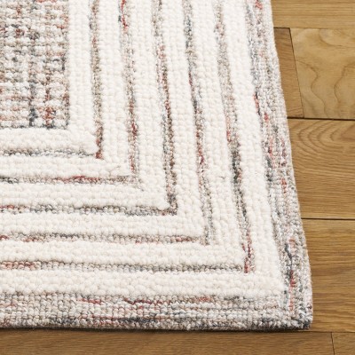 Ebony EBN425 Handmade Tufted Rug - Safavieh