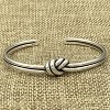 Handmade Sterling Silver Knot Cuff Bracelet, Adjustable Minimalist Tied Wire Design, Unisex Jewelry Gift - 4 of 4