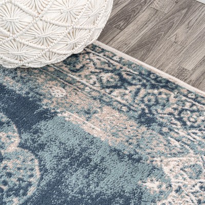 Ivory and Blue Medallion 8' x 10' Synthetic Area Rug