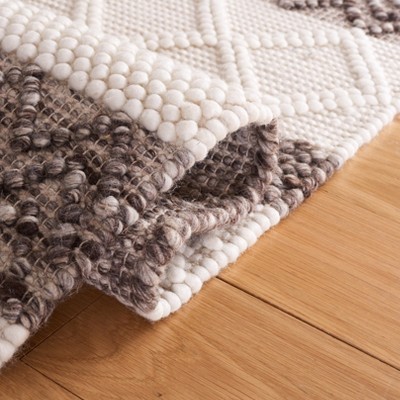 Ivory Coast Woolen 8' x 10' Handmade Flat Woven Area Rug