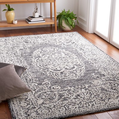 Safavieh 5 x 8 ft. Black and Ivory Hand-Tufted Wool Area Rug