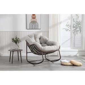 Lyngins Outdoor Rattan Nursery Rocking Chair with Steel Frame,Upholstered Glider Rocking Chair,Hand-woven Accent Chair for Living Room - 1 of 3
