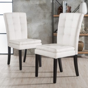 Racxily Dining Chair, a padded cushion seat with a stylish tufted backrest - 1 of 4