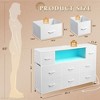 8-Drawer Fabric Dresser with Charging Station and LED Lights, TV Stand for 55-Inch - 4 of 4