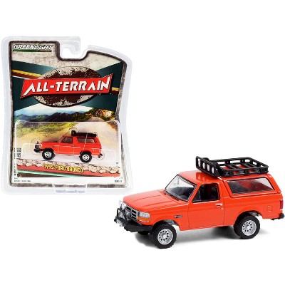 1995 Ford Bronco Sport with Off-Road Parts Orange "All Terrain" Series 11 1/64 Diecast Model Car by Greenlight