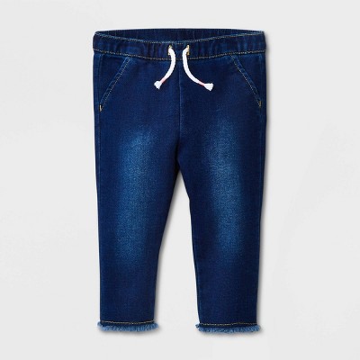 Image of Baby Girls' Raw Edge Denim Pants - Cat & Jack™ Light Wash 0-3M