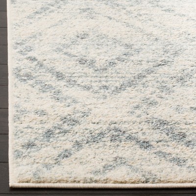 Ivory and Light Blue Geometric Rectangular Area Rug