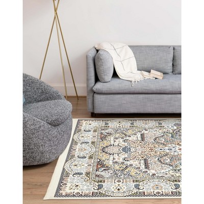 Ivory and Multicolor 8' x 10' Synthetic Rectangular Area Rug