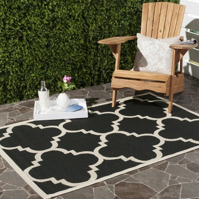 Courtyard Chic 5' x 7' Black Synthetic Easy-Care Area Rug
