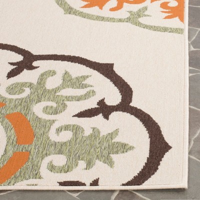 Cream and Terracotta Floral Synthetic Indoor/Outdoor Area Rug