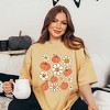 Simply Sage Market Women's Distressed Flowers And Pumpkins Short Sleeve Garment Dyed Tee - 2 of 4