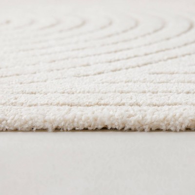 Cream Synthetic 5' x 7' Reversible Rectangular Rug