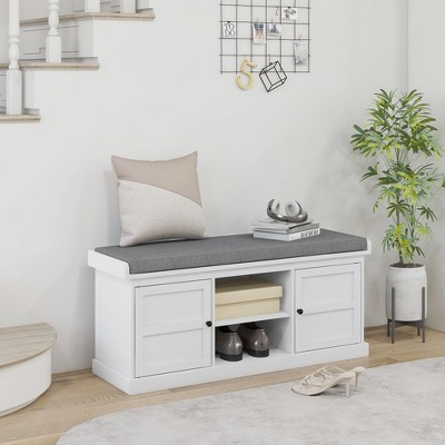 White Wood Storage Bench with Gray Cushion and Cabinets