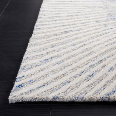 Blue and Ivory Abstract Handmade Wool 8' x 10' Area Rug