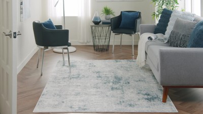 Ivory Blue Abstract 6'6" x 9'6" Area Rug