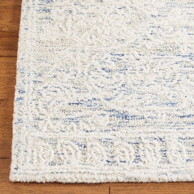 Ivory and Blue Handmade Wool Abstract Tufted Area Rug, 8' x 10'