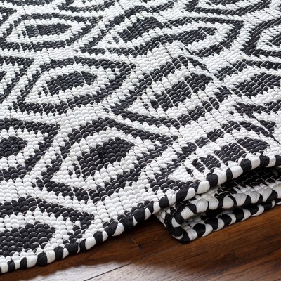 Handmade Black and Ivory Braided Synthetic Area Rug 5' x 7'