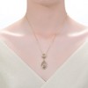"Rhodium and 14K Gold Plated Cubic Zirconia Pendant Necklace – Elegant and Sparkling Jewelry" - 2 of 3
