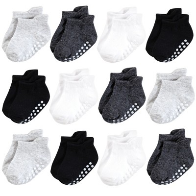 Image of Hudson Baby Infant Boy Non-Skid No-Show Socks, Black White, 4-6 Toddler