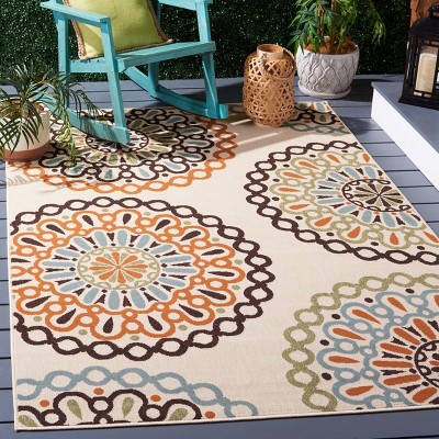 Cream and Terracotta Floral Synthetic Indoor/Outdoor Rug
