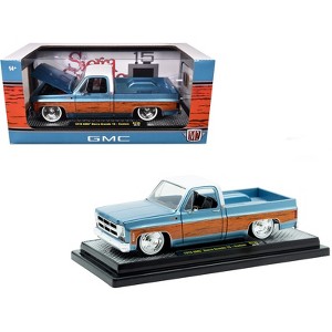 1976 GMC Sierra Grande 15 Pickup Truck Blue Metallic with White Top and Woodgrain Sides 1/24 Diecast Model Cars by M2 Machines - 1 of 3