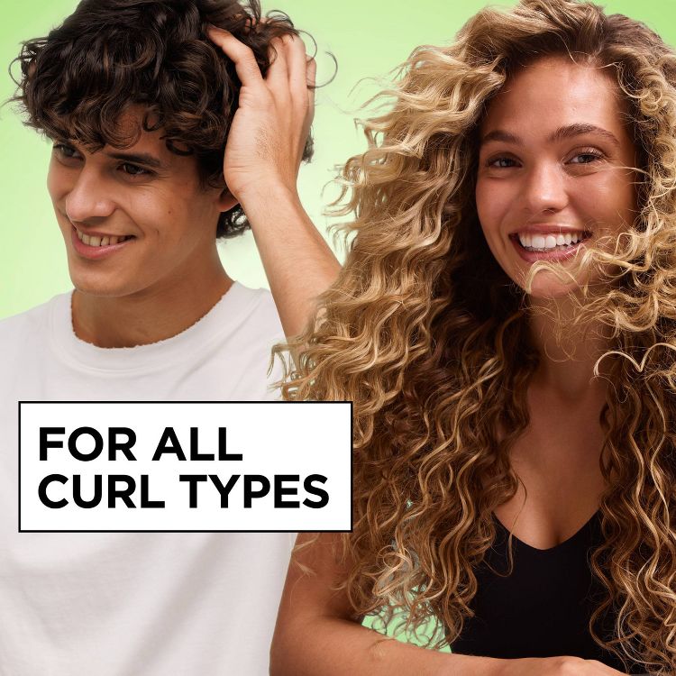 Two people with curly hair smiling, with the text "FOR ALL CURL TYPES" displayed in a box.