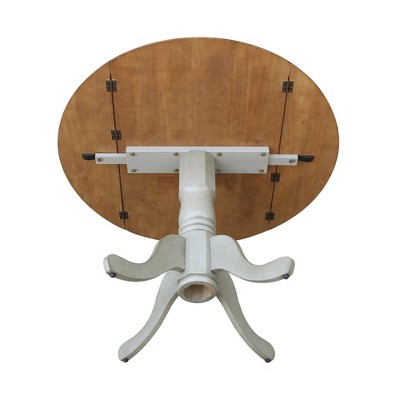 Casual Round Wood Extendable Dining Table in Distressed Hickory