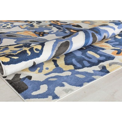 8' x 10' Black and Blue Floral Synthetic Area Rug