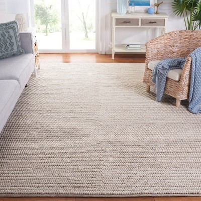 Ivory and Beige 8' x 10' Handwoven Wool and Synthetic Area Rug