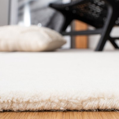 Artisan Tufted Black Wool Rectangular Rug 4' x 6'