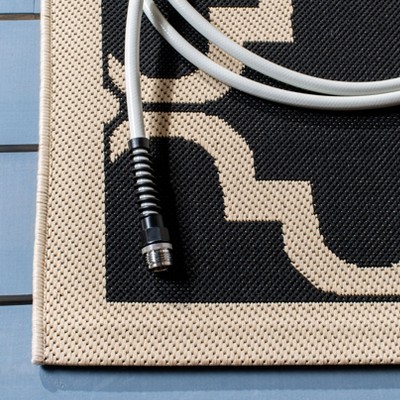 Courtyard Estelle 2'3" x 8' Black/Beige Synthetic Indoor/Outdoor Runner Rug