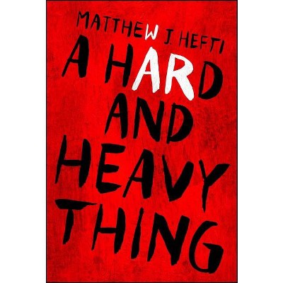 A Hard and Heavy Thing - by  Matthew J Hefti (Paperback)