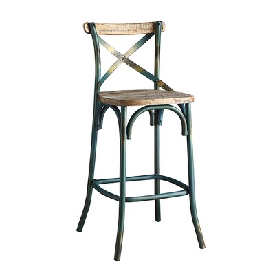 Close-up of antique teal bar stool with wooden seat and cross-back