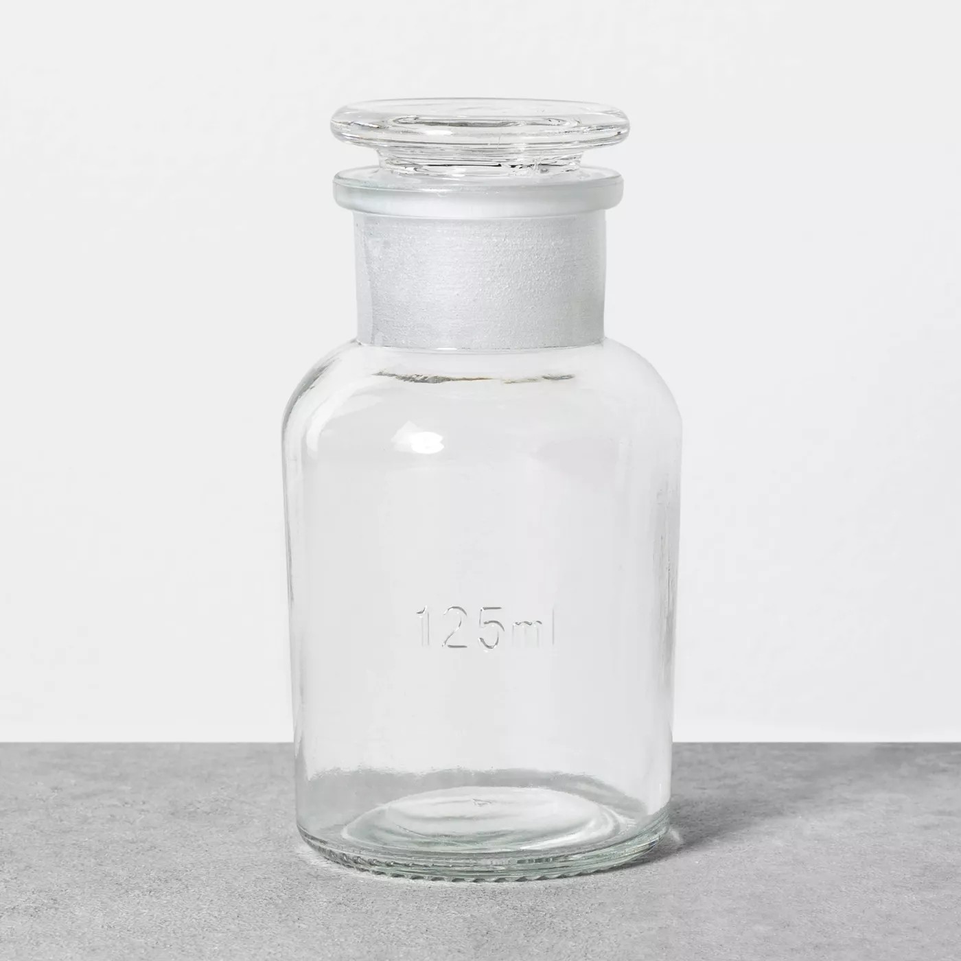 Apothecary Glass Storage Bottle - Hearth & Hand™ with Magnolia - image 1 of 5