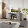 Farmhouse TV Stand for TVs Up to 65", Rustic Entertainment Center with Sliding Barn Doors - 2 of 4